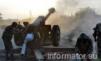 Україна відводить важке озброєння з лінії фронту