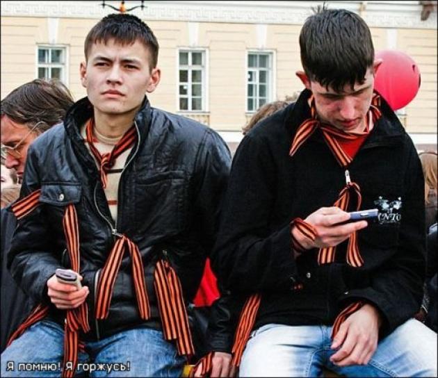 В пост-советском пространстве развернута информационная акция по замене георгиевской ленточки на цвета государственного флага