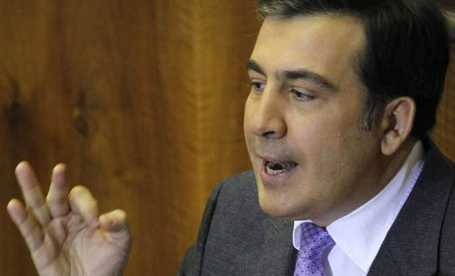 Галстук, который он жевал, семь лет уже сосет Россия