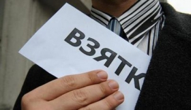 На Житомирщині упіймали на хабарі керівника РДА і голову райради