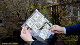 На взятке поймали женщину, которая переаттестовывала милицию в полицию. Фото