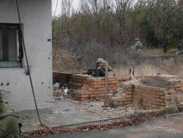 Новобранцы "Железной" бригады на опыте участников АТО отрабатывают штурмовые действия. ФОТОрепортаж