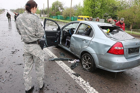 Нові фото після обстрілу Оленівки: знищені авто і фрагменти тіл