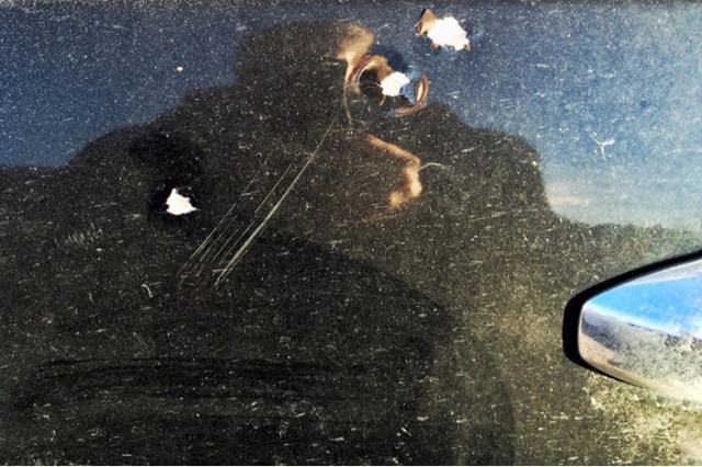 С места расстрела бизнесмена с охранниками исчезли десятки тысяч долларов