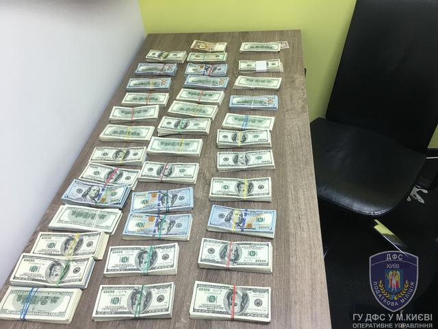 Киевские налоговики ликвидировали международную схему легализации денег с использованием криптовалют