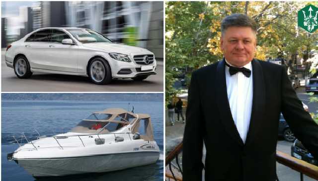 Одиозный судья с собственной яхтой получил в подарок автомобиль от КГГА