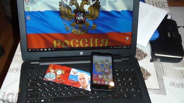 У Запоріжжі впіймали російських шпигунів з портретом Путіна
