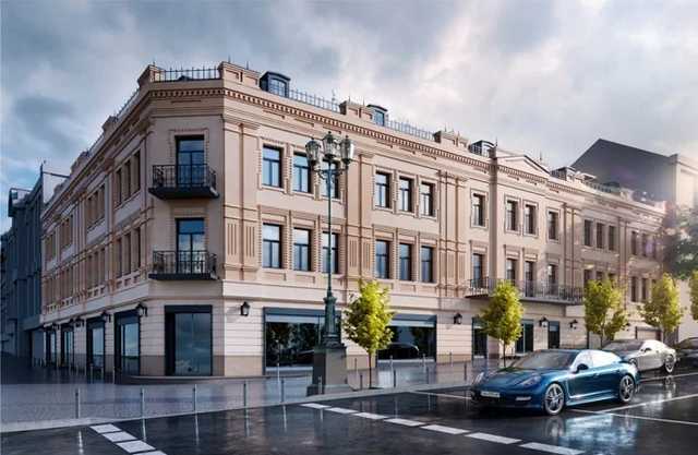 ТЦ с подземным паркингом и кафе: появился проект реставрации гастронома на Крещатике