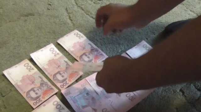 Под Харьковом мошенники играючи снимали деньги со счетов кредитных учреждений