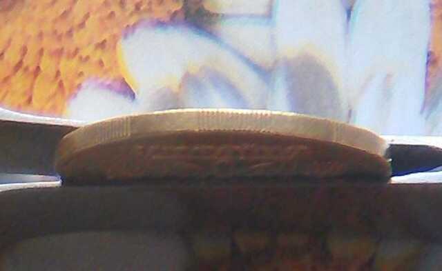 В Украине 50-копеечную монету с необычной деталью продают за 150 тысяч