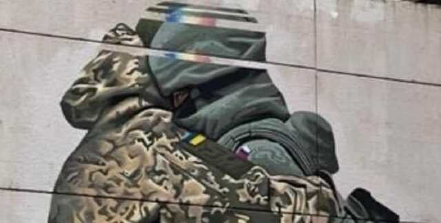 Хибний мир: у Мельбурні намалювали мурал з українським і російським солдатами, які обіймаються