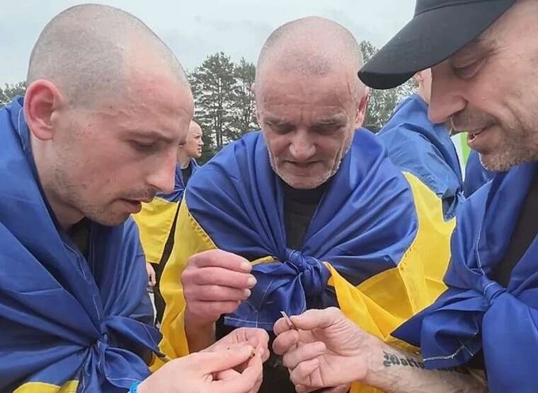 "Three years we didnt eat chocolate": Freed prisoners of war share a treat