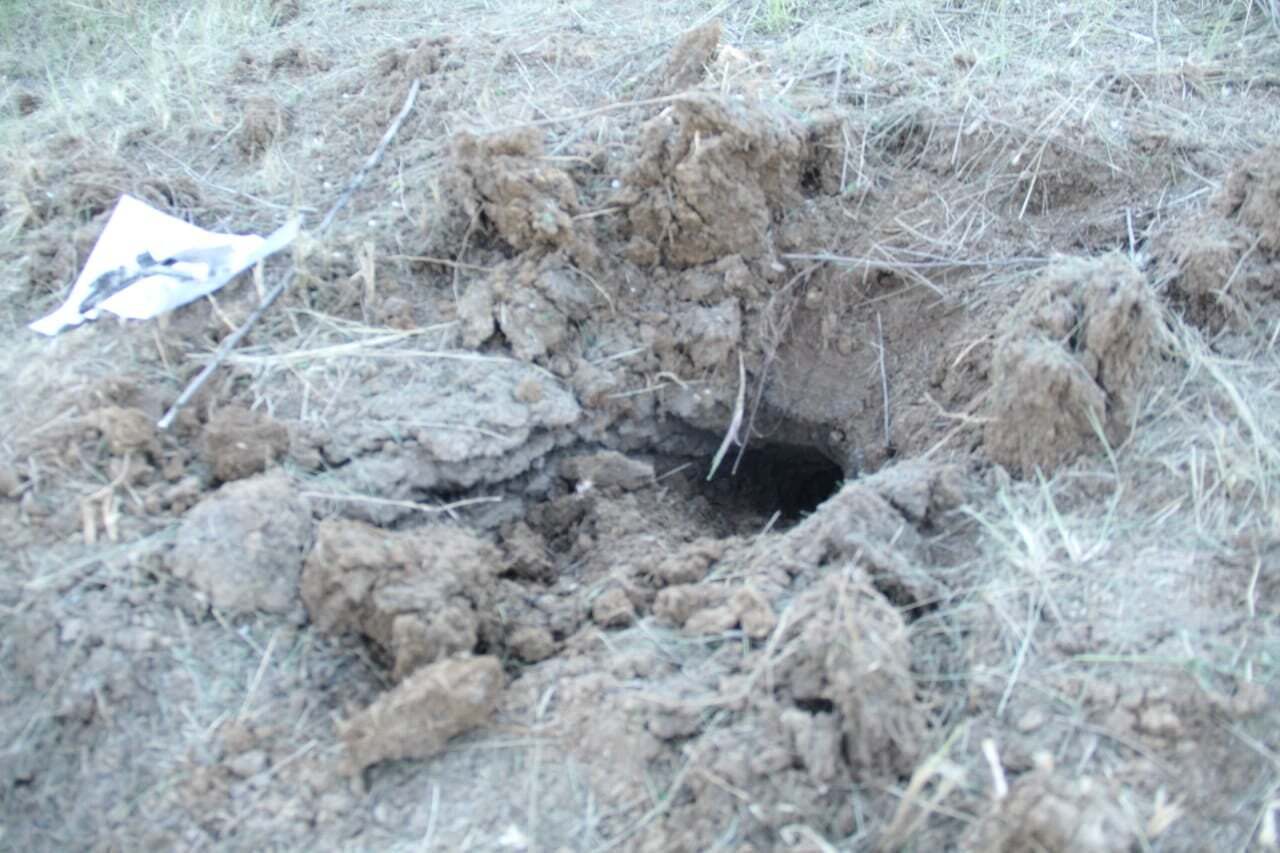 Воронка в земле