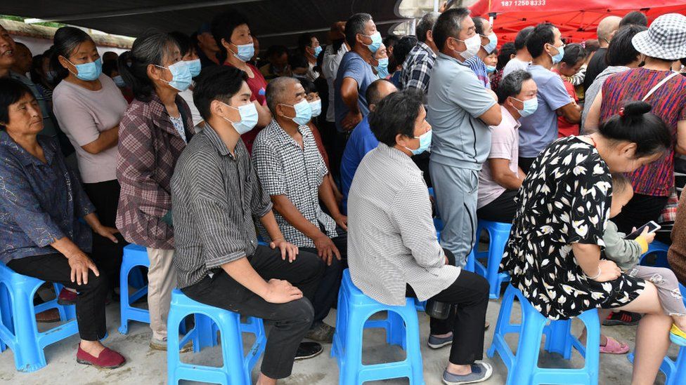 rural residents wait of vaccine in Anhui dqxikeidqxidqeant