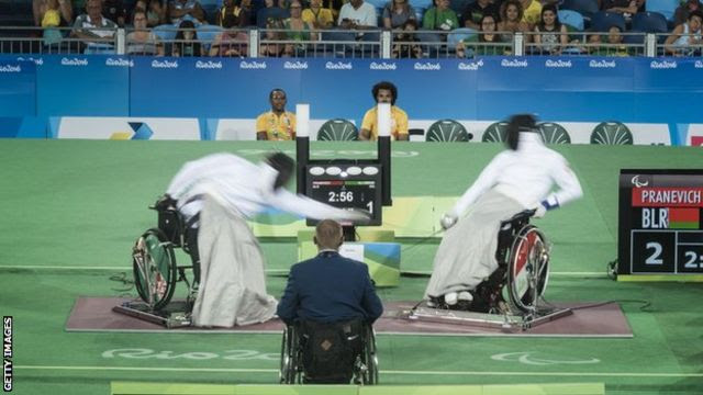 Andrei Pranevich of Belarus battles Ammar Ali of Iraq in the final of Wheelchair Fencing Men’s Category B at the Rio Paralympic Games