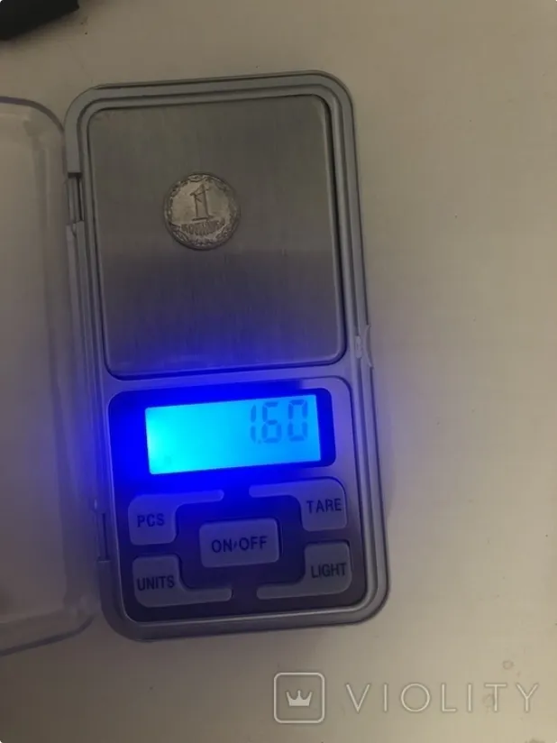 Вес монеты – 1,6 г