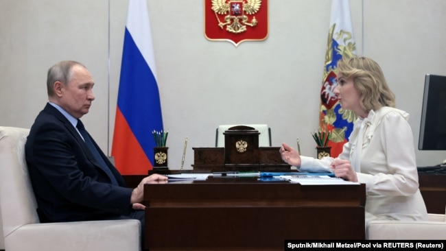 Москва, 16 февраля 2023 года. Российский президент Владимир Путин и уполномоченная при президенте России по правам ребенка Мария Львова-Белова. 17 марта 2023 г. Международный уголовный суд выдал ордер на их арест