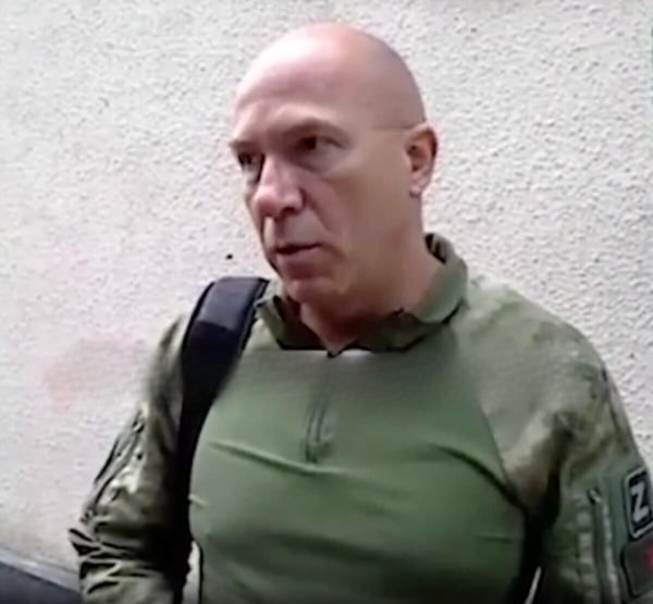 Фото: Керівник Білоруського Червоного Хреста з рашистською свастикою